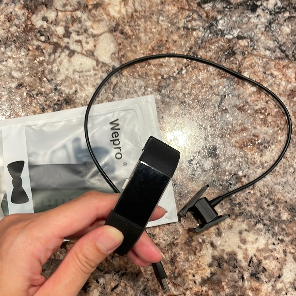 Fitbit Charge 2 with charger and extra bands (S/M)